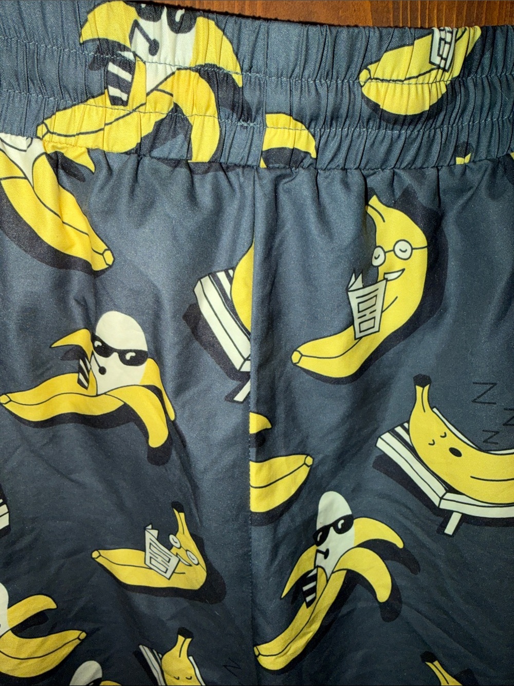 SHEIN Navy Swim Trunks with Yellow Banana Pattern - Picture 5 of 6